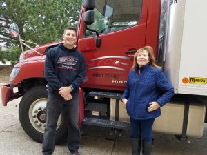 Terry from EFCO Metal Finishing helps Blessings in a Backpack